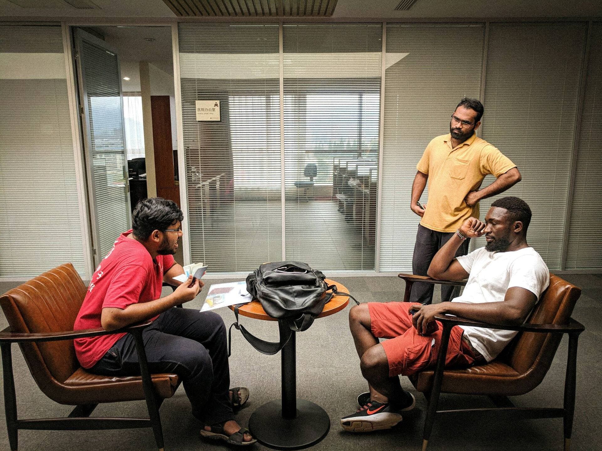 Colleagues talking through a project in a lounge